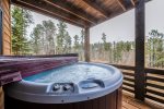  Camp Lodge Gold deck with hot tub and forest views. 